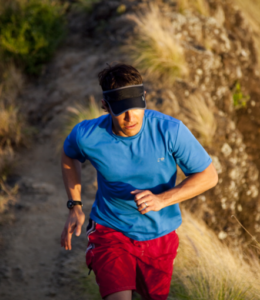 A runner on a hill in Hawaii.