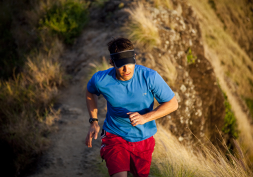 A runner on a hill in Hawaii.