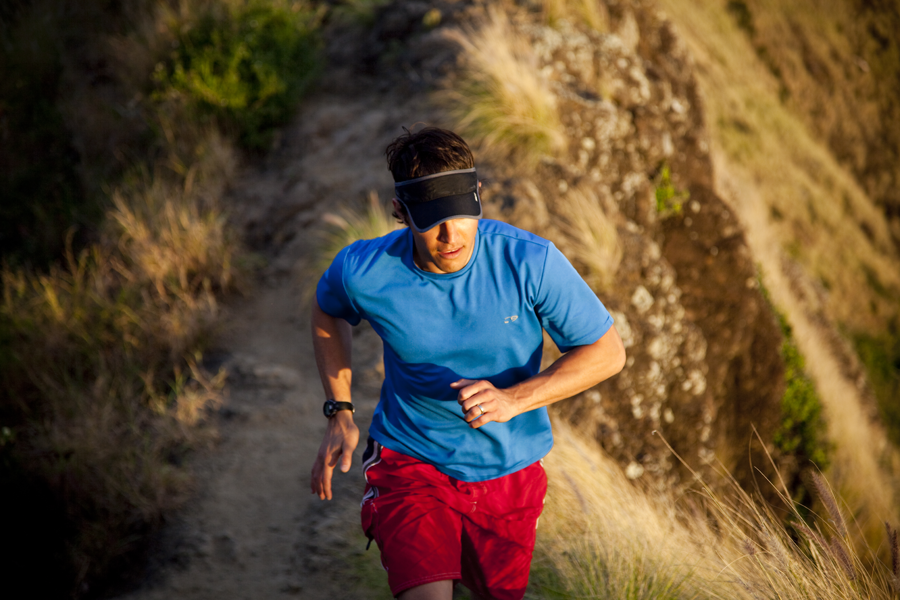 A runner on a hill in Hawaii.