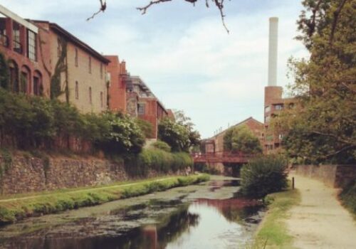 buildings on a channel showing job fit