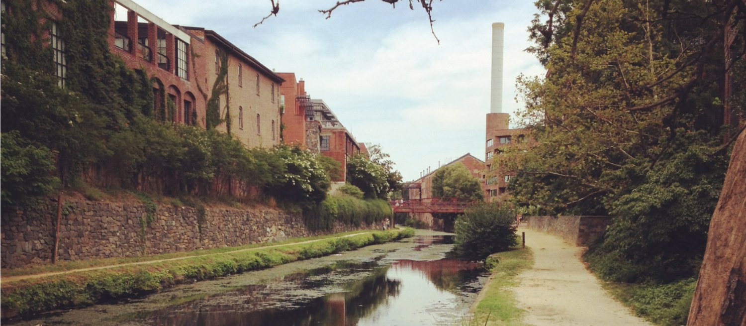 buildings on a channel showing job fit