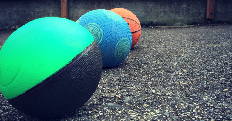 Get 3 balls of different sizes and weights.