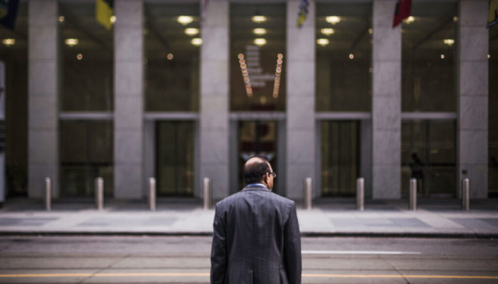 CEO-standing-in-front-of-a-building