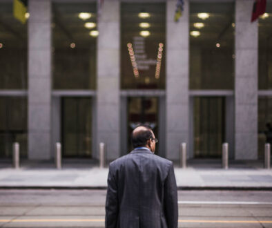 CEO-standing-in-front-of-a-building