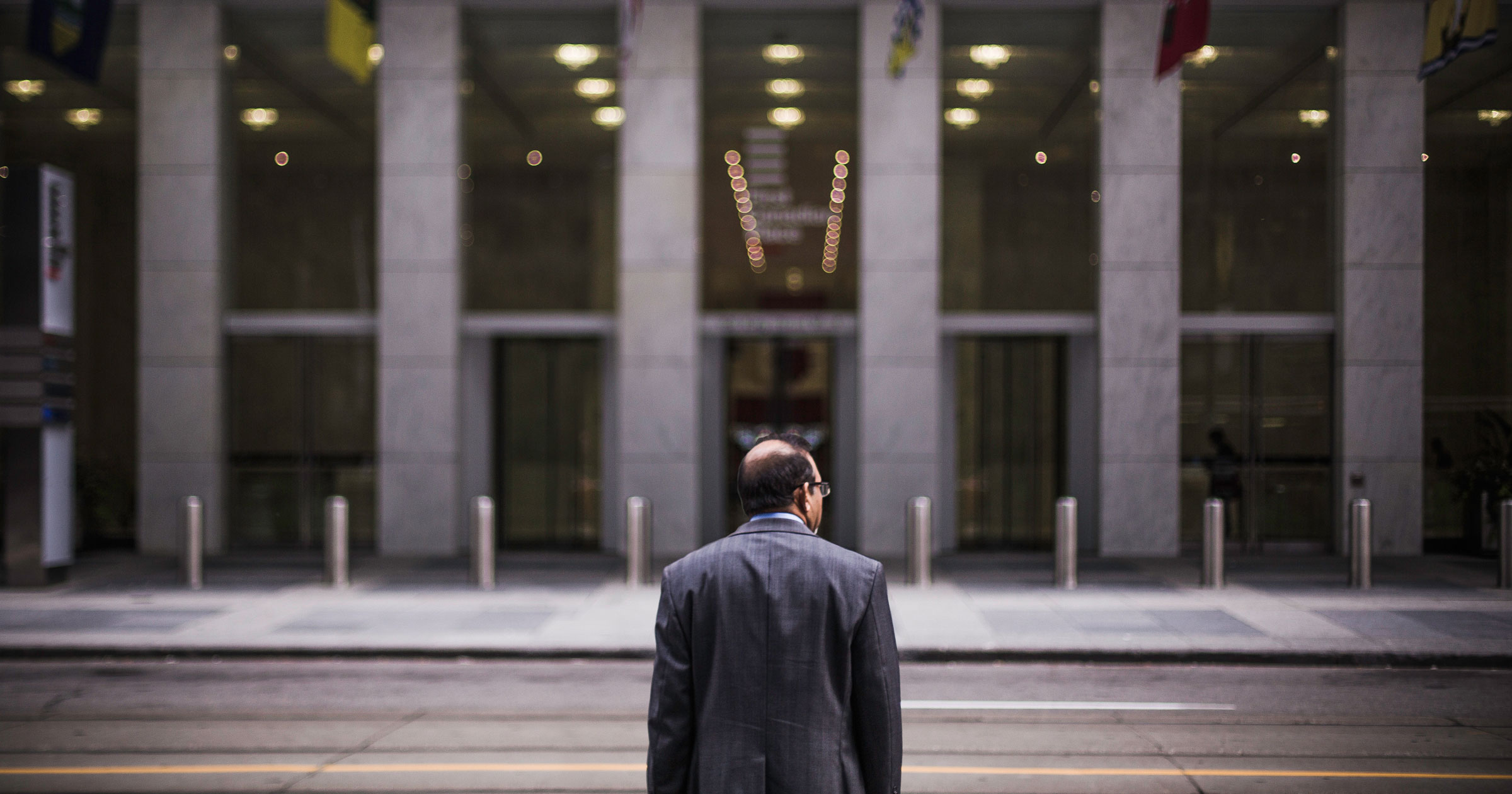 CEO-standing-in-front-of-a-building