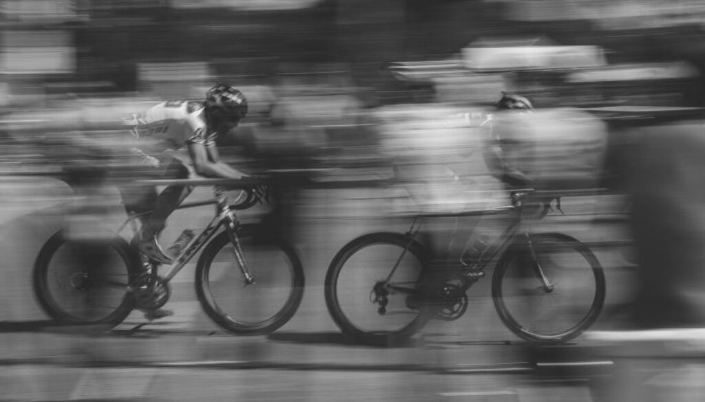 two cyclists racing in competition