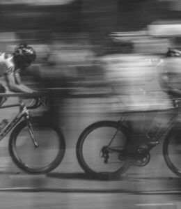 two cyclists racing in competition