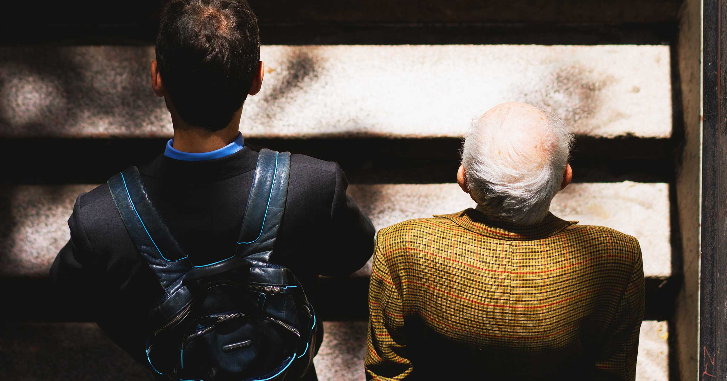 old-and-young-man-walking